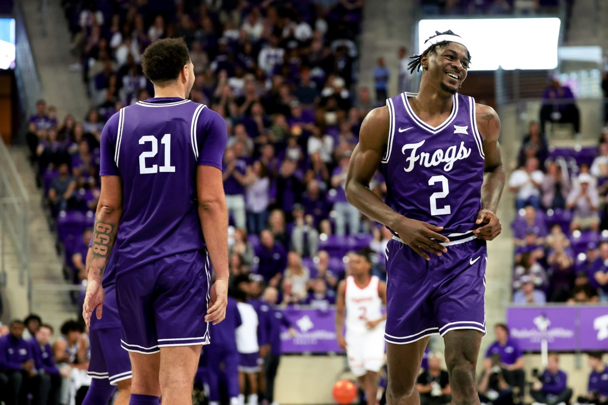 TCU Horned Frogs forward Emanuel Miller (2) celebrates with TCU Horned Frogs forward JaKobe Coles (21) during the second half against the Cincinnati Bearcats at Ed and Rae Schollmaier Arena.