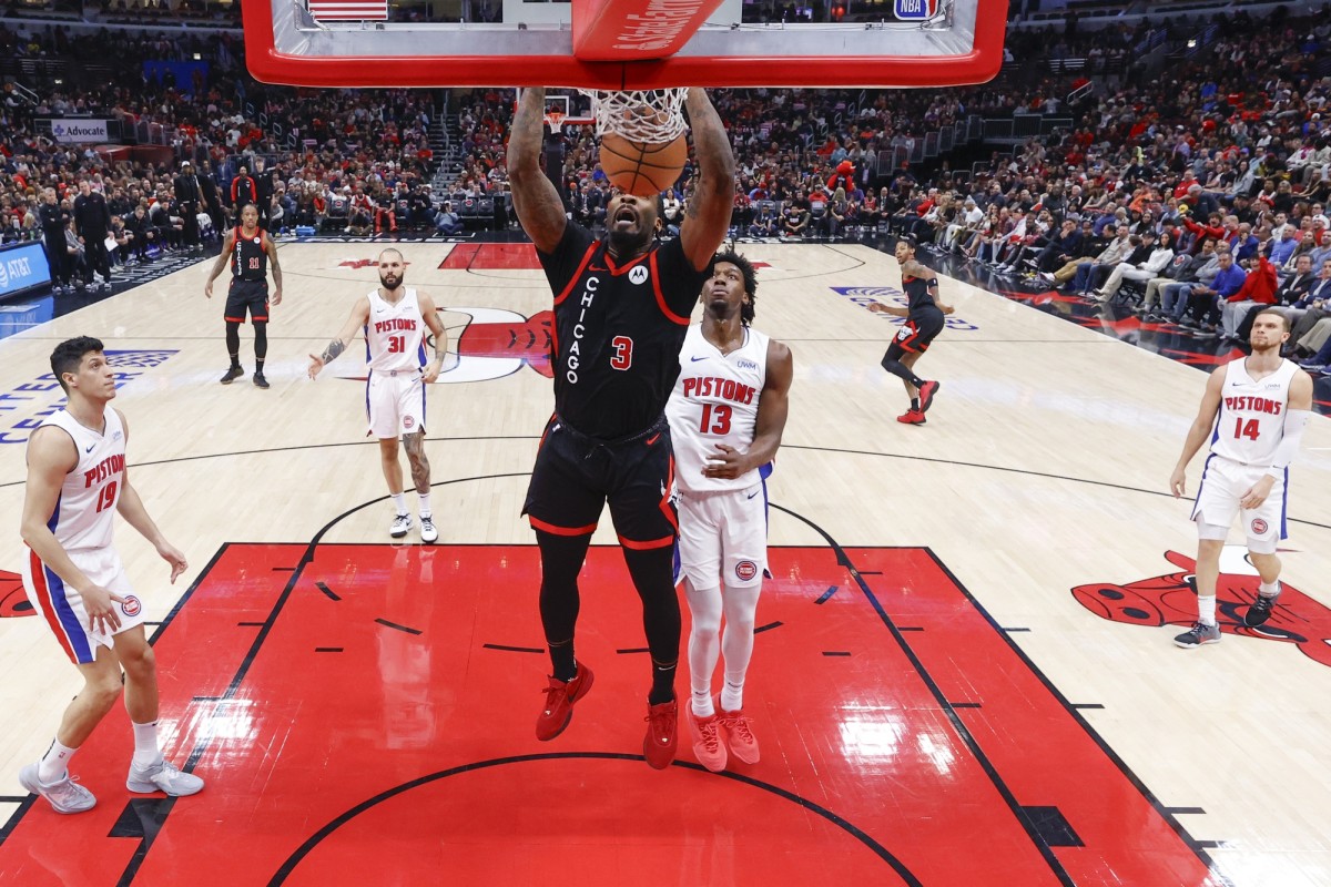 Chicago Bulls center Andre Drummond (3) dunks the ball against the Detroit Pistons during the first half at United Center. 