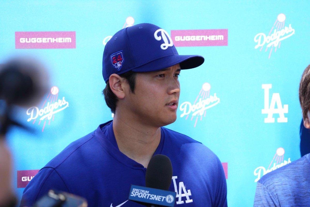 Feb 29, 2024; Glendale, AZ, USA; Los Angeles Dodgers designated hitter Shohei Ohtani speaks to media during a workout at Camelback Ranch.