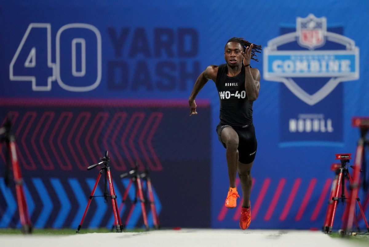 Mar 2, 2024; Indianapolis, IN, USA; Texas wide receiver Xavier Worthy (WO40) ran an official time of 4.21 seconds to set a combine record during the 2024 NFL Combine at Lucas Oil Stadium.