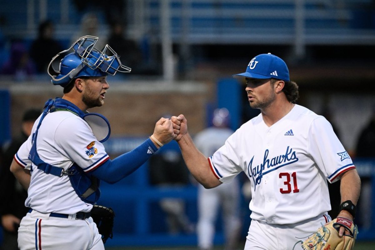 Reese Dutton Fist-Bumping Catcher Jake English