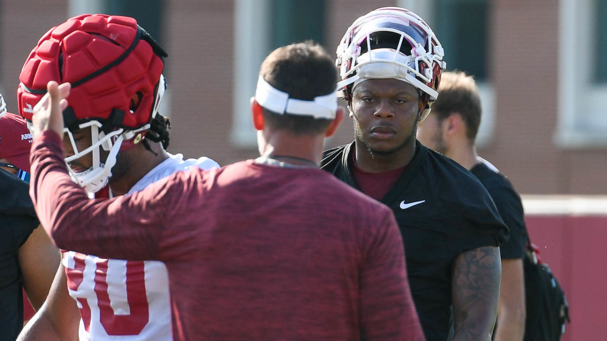 Razorbacks quarterback KJ Jefferson during Friday morning's practice on the outdoor fields