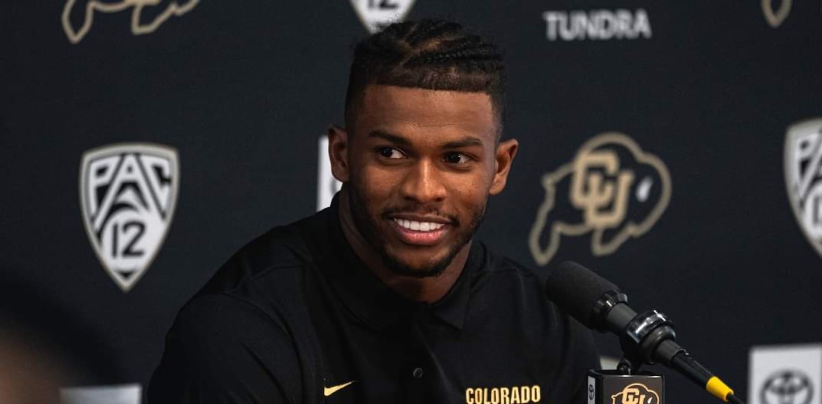 Shilo Sanders at the podium for CU Media Day