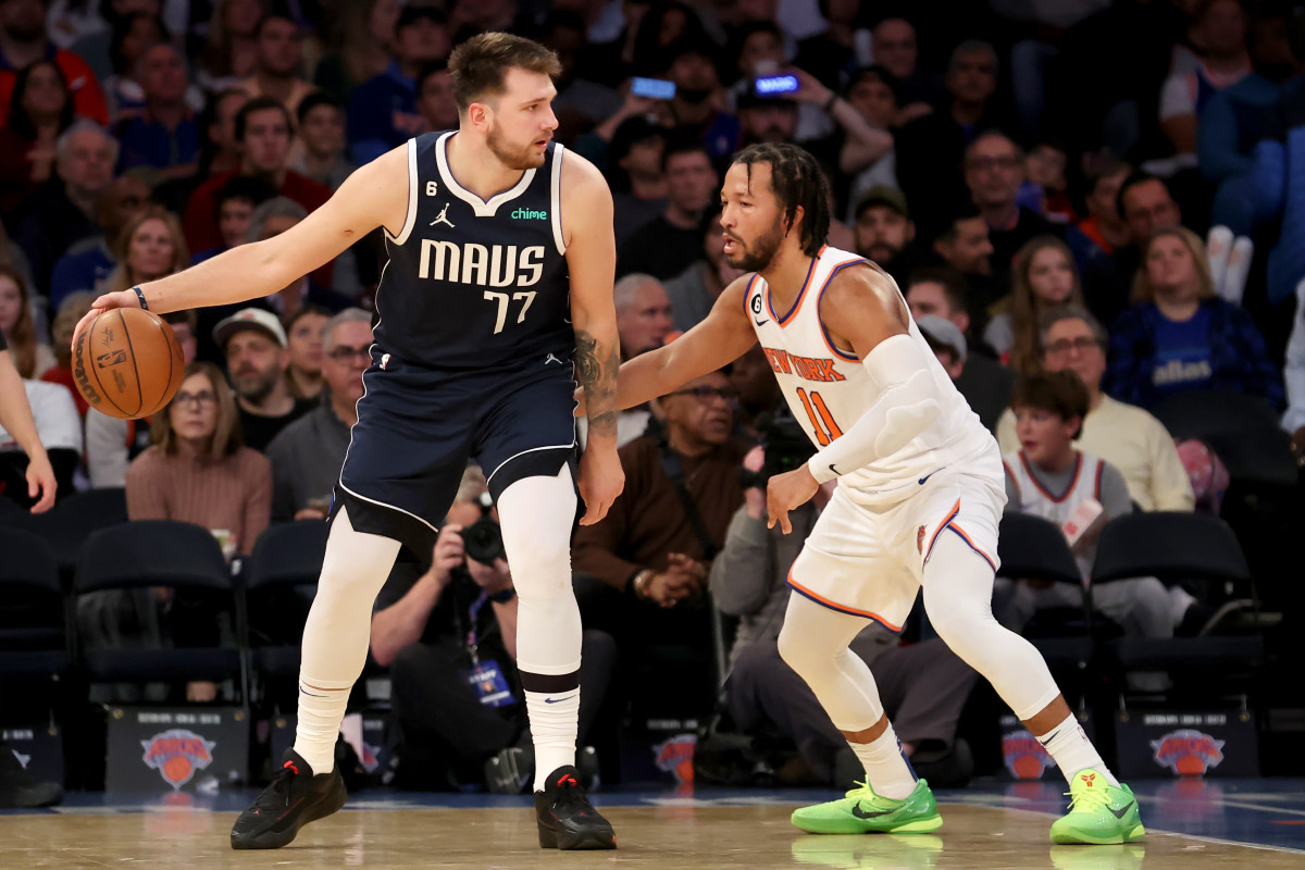 Dec 3, 2022; New York, New York, USA; Dallas Mavericks guard Luka Doncic (77) controls the ball against New York Knicks guard Jalen Brunson (11) during the third quarter at Madison Square Garden. Mandatory Credit: Brad Penner-USA TODAY Sports