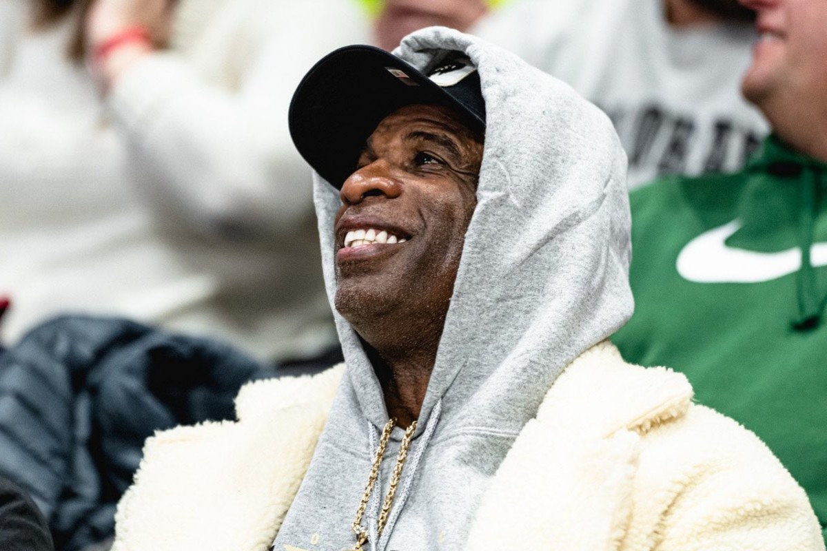 Deion Sanders takes in CU Basketball game on campus