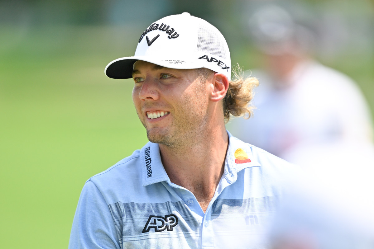 Sam Burns smiles on the 12th green during the second round of the FedEx St. Jude Championship at TPC Southwind on August 11, 2023 in Memphis, Tennessee. 