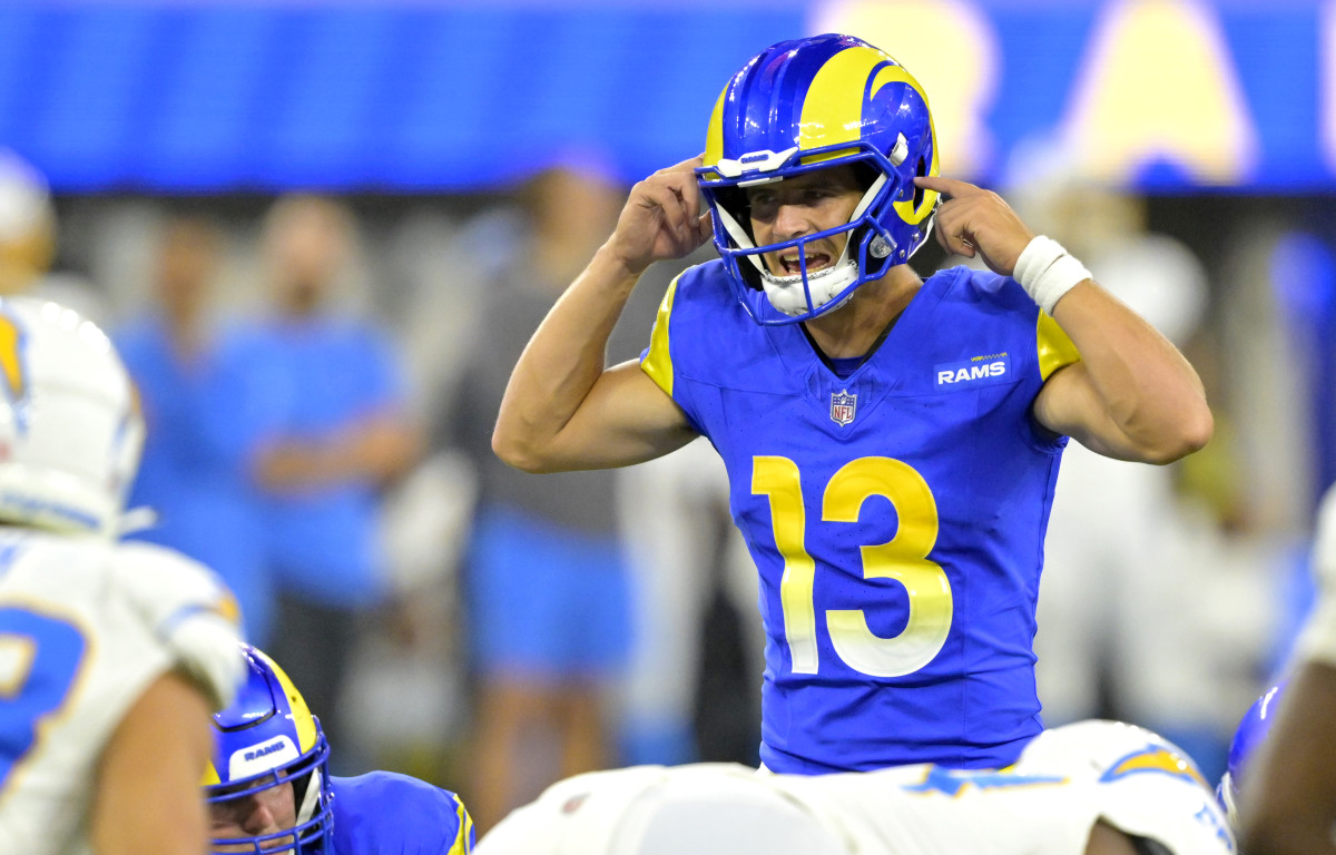 Los Angeles Rams quarterback Stetson Bennett (13) looks to throw a pass as  quarterback Matthew Stafford (9) watches him at the NFL football team's  training camp, Saturday, July 29, 2023, in Irvine