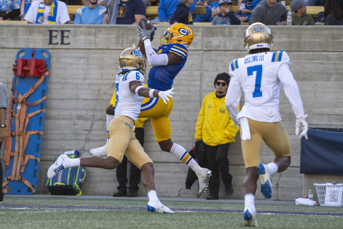 November 25, 2022; Berkeley, California, USA; California Golden Bears wide receiver Jeremiah Hunter (3) catches a touchdown catch against UCLA Bruins defensive back John Humphrey (6) during the second quarter at California Memorial Stadium. Mandatory Credit: Kyle Terada-USA TODAY Sports