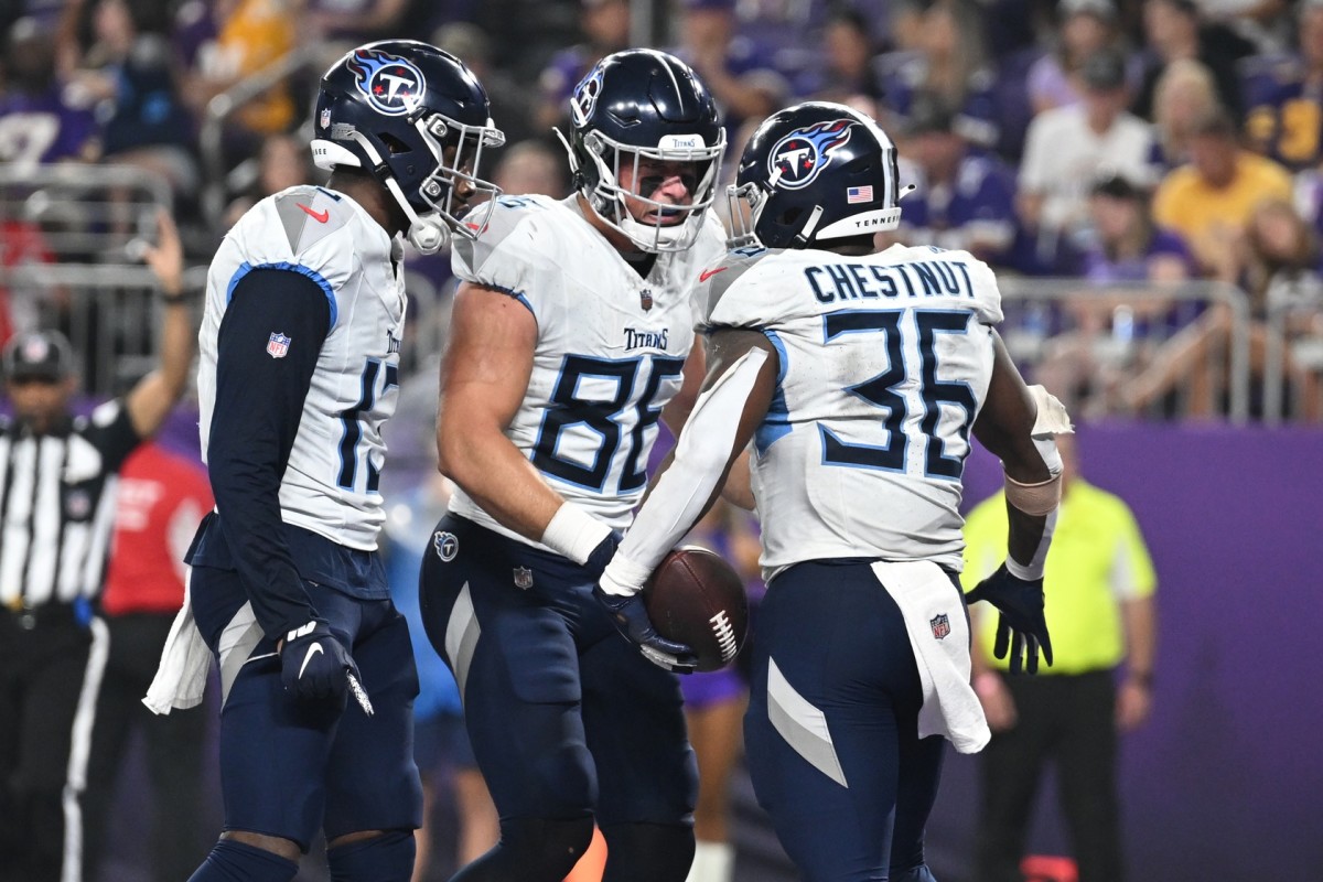 Tennessee Titans running back Julius Chestnut (36) celebrates with  teamamtes after running the ball for a touchdown in the second half of a  preseason NFL football game against the Minnesota Vikings, Saturday