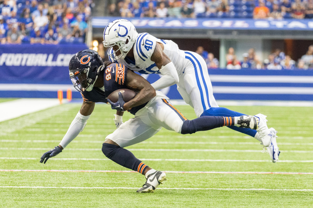 Indianapolis Colts safety Nick Cross (20) tackles Detroit Lions