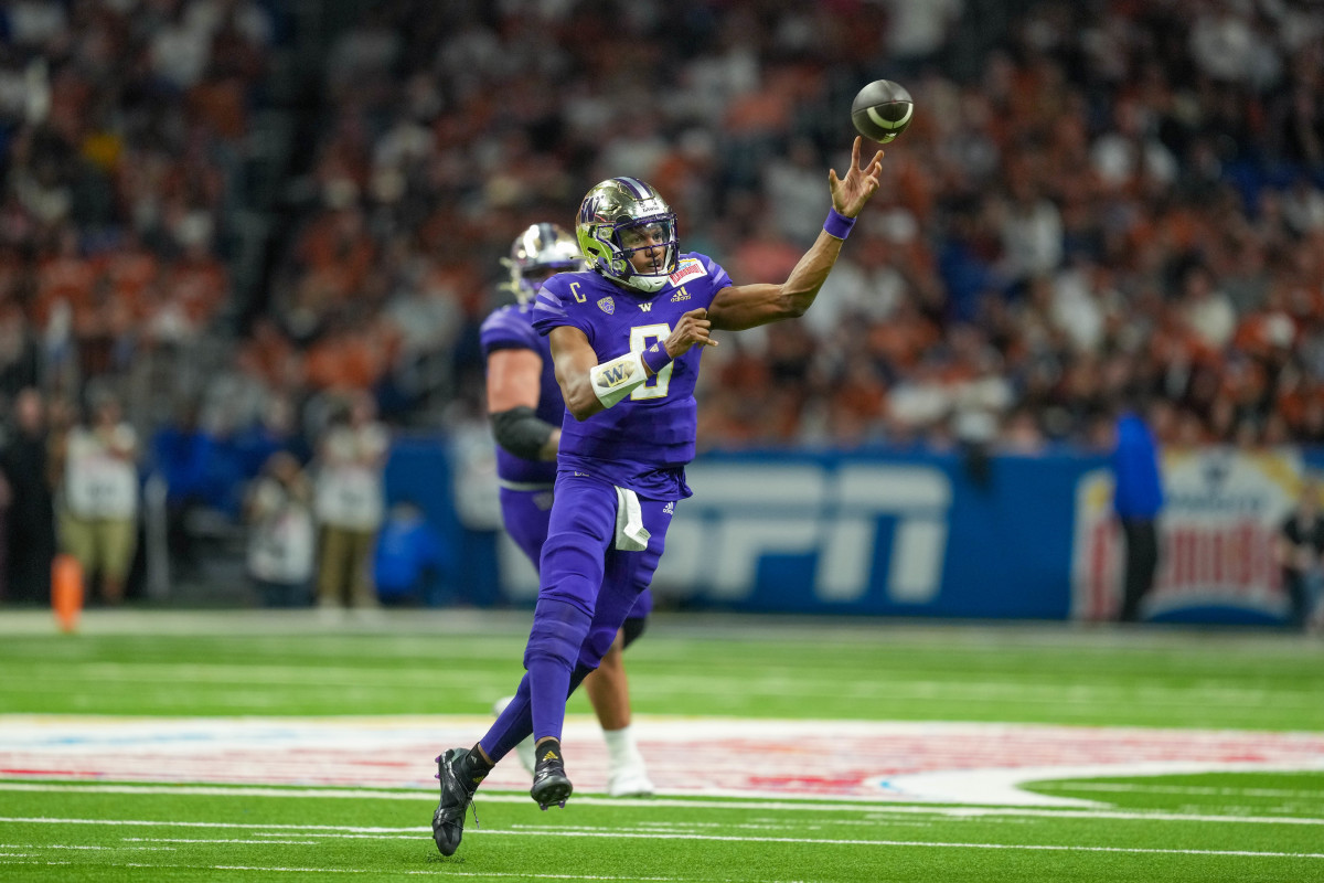 Dec 29, 2022; San Antonio, Texas, USA; Washington Huskies quarterback Michael Penix Jr. (9) throws a pass in the 2022 Alamo Bowl against the Texas Longhorns at the Alamodome. Mandatory Credit: Daniel Dunn-USA TODAY Sports