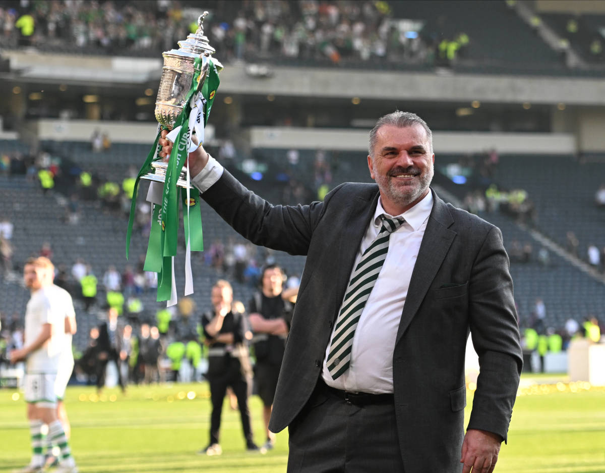 Ange Postecoglou pictured lifting the Scottish Cup trophy after leading Celtic to victory over Inverness in the 2023 final