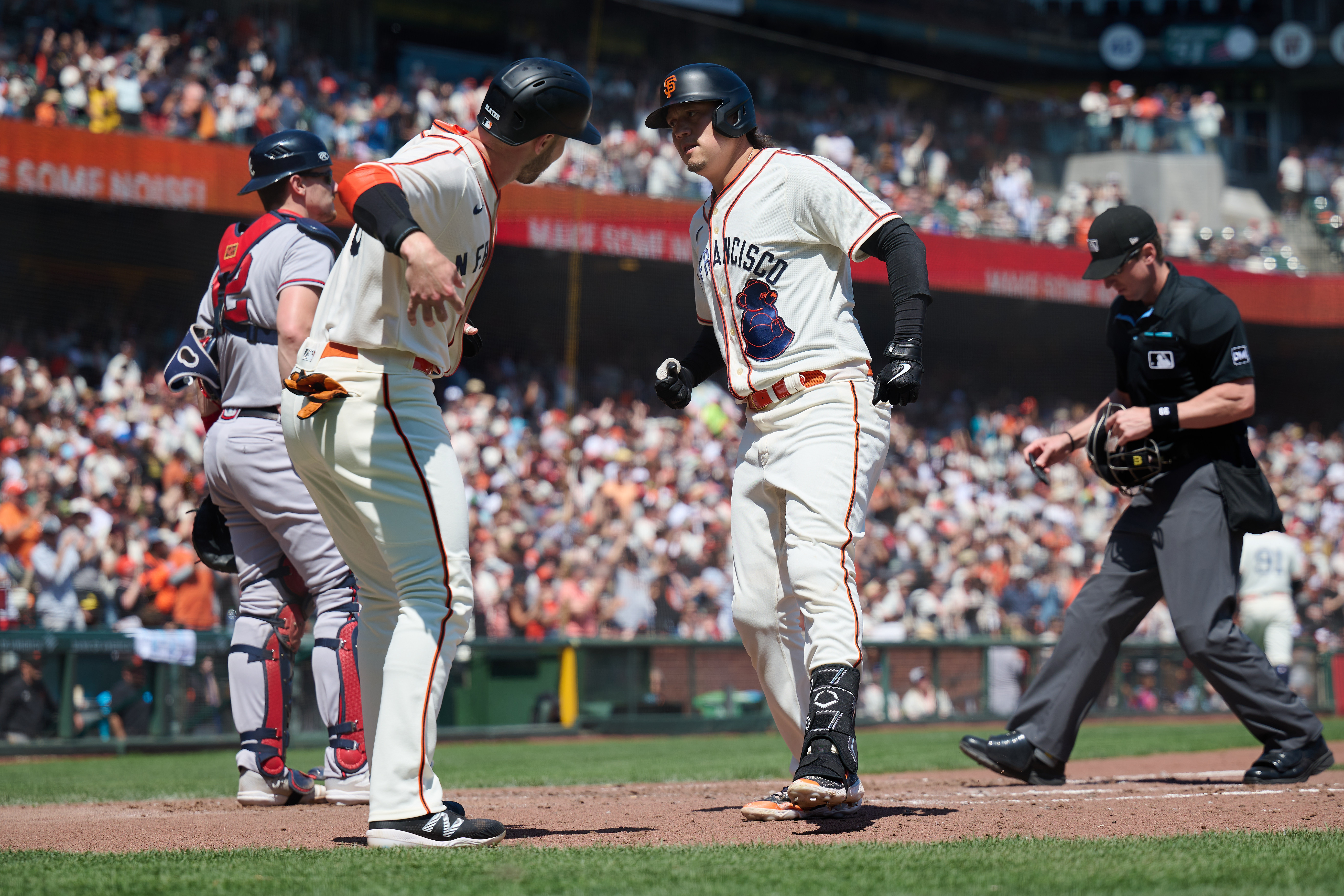 San Francisco Giants' Wilmer Flores hits a three-run home run against the  the San Diego Padres during the sixth inning of the second game of a  baseball doubleheader Friday, Sept. 25, 2020