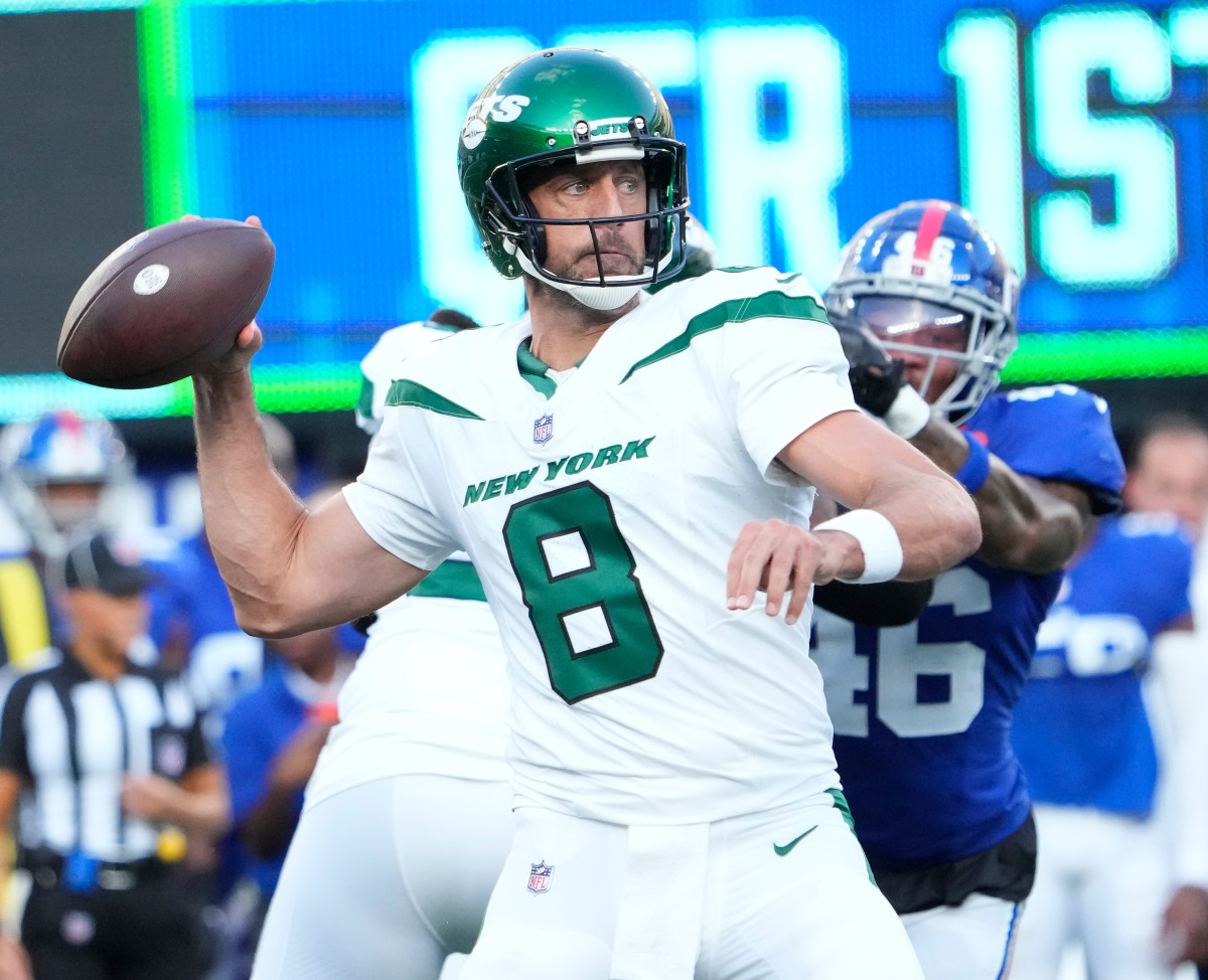 Jets' QB Aaron Rodgers (8) attempts a pass against the Giants on August 26 at MetLife Stadium