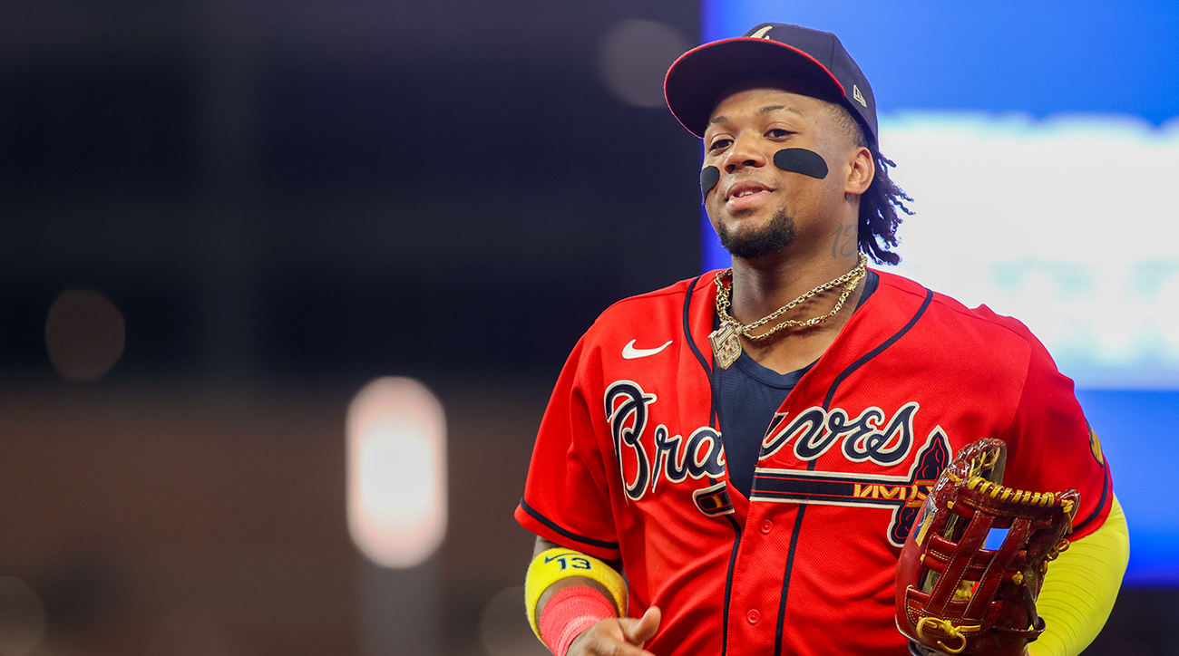 Multiple Fans Rush Field and Make Contact With Braves' Ronald