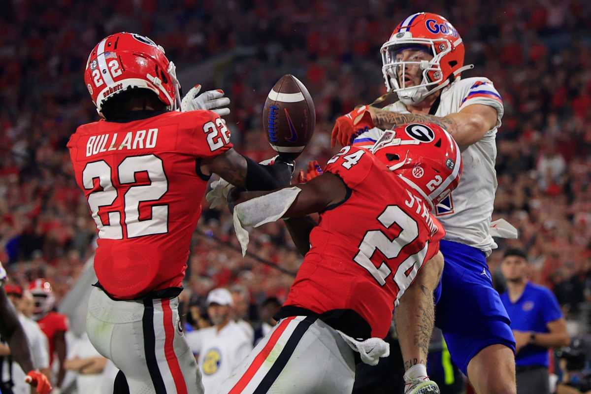 Florida Gators wide receiver Ricky Pearsall (1) has his pass broken up by Georgia Bulldogs defensive back Malaki Starks (24) and defensive back Javon Bullard (22) during the fourth quarter of an NCAA football game Saturday, Oct. 29, 2022 at TIAA Bank Field in Jacksonville.The Georgia Bulldogs held off the Florida Gators 42-20. Corey Pom Oct2022 14