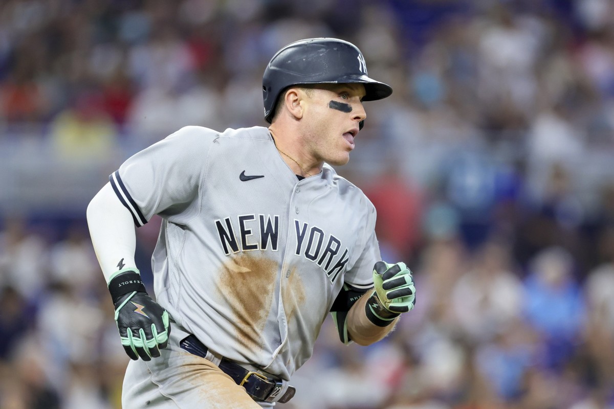 New York Yankees outfielder Harrison Bader (22) runs the bases after putting the ball in play.