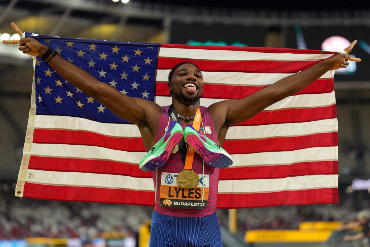 Budapest, Hungary; Noah Lyles (USA) poses for photographs after winning the mens 200m race during the 2023 World Athletics Championships at National Athletics Centre. 