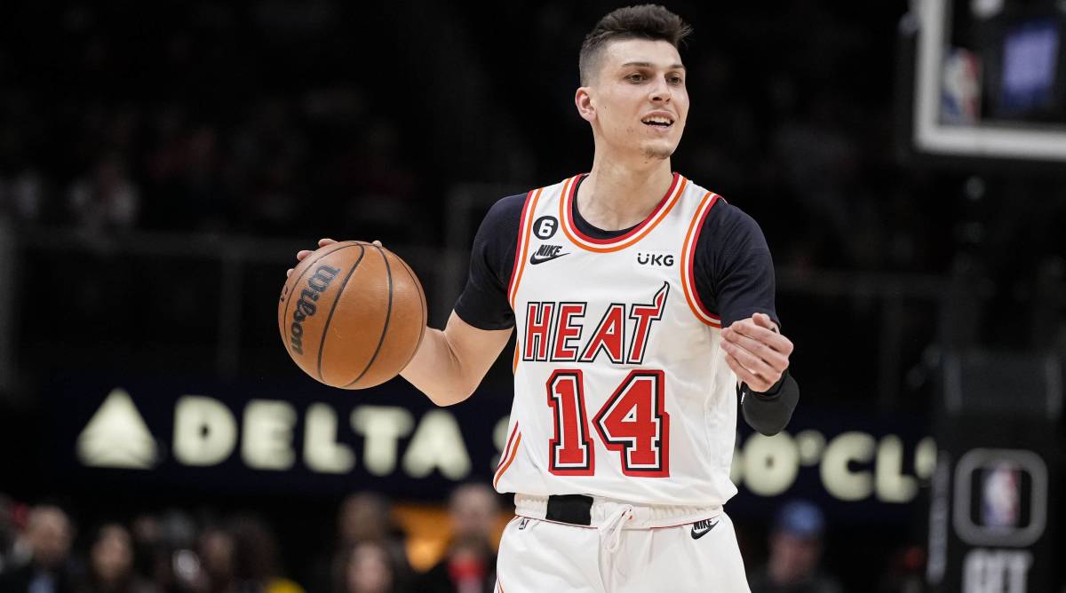 Heat guard Tyler Herro dribbles the ball in a game.