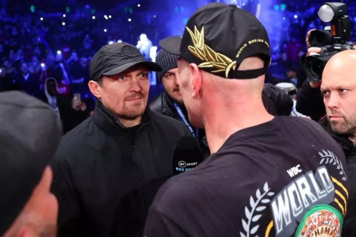 Tyson Fury and Oleksandr Usyk meet in person, stoking the flames for a potential boxing heavyweight title unification bout.