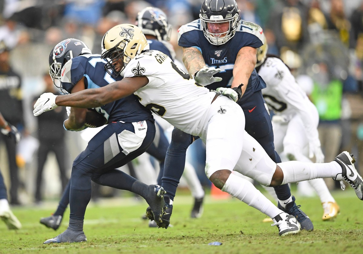 Dec. 22, 2019; New Orleans Saints defensive end Carl Granderson (96) stops Tennessee Titans running back Dalyn Dawkins (28). © George Walker IV / Tennessean.com, Nashville Tennessean via Imagn Content Services, LLC