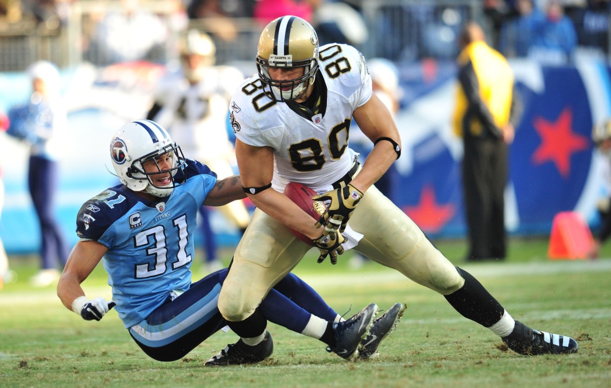 Dec 11, 2011; Tennessee Titans corner back Cortland Finnegan (31) fails to break up a pass to New Orleans Saints tight end Jimmy Graham (80). Mandatory Credit: Don McPeak-USA TODAY