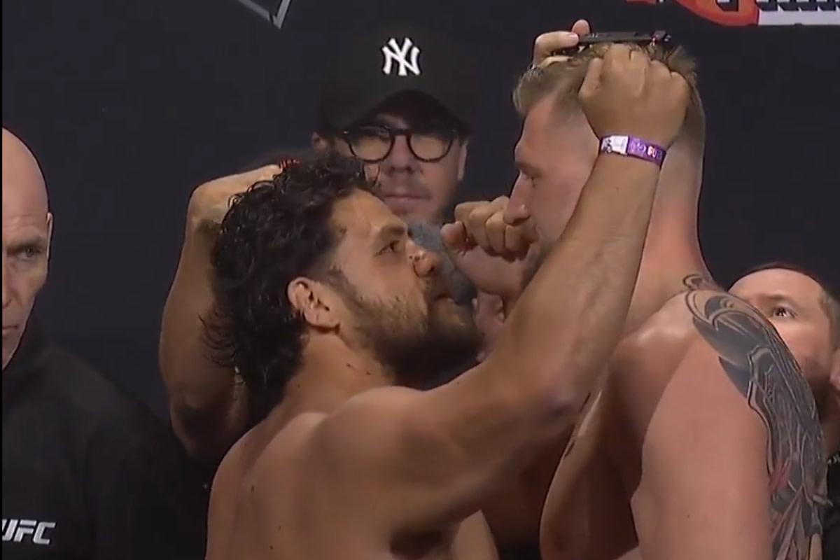 Tai Tuivasa and Alexander Volkanovski stare down at the UFC 293 ceremonial weigh-ins.