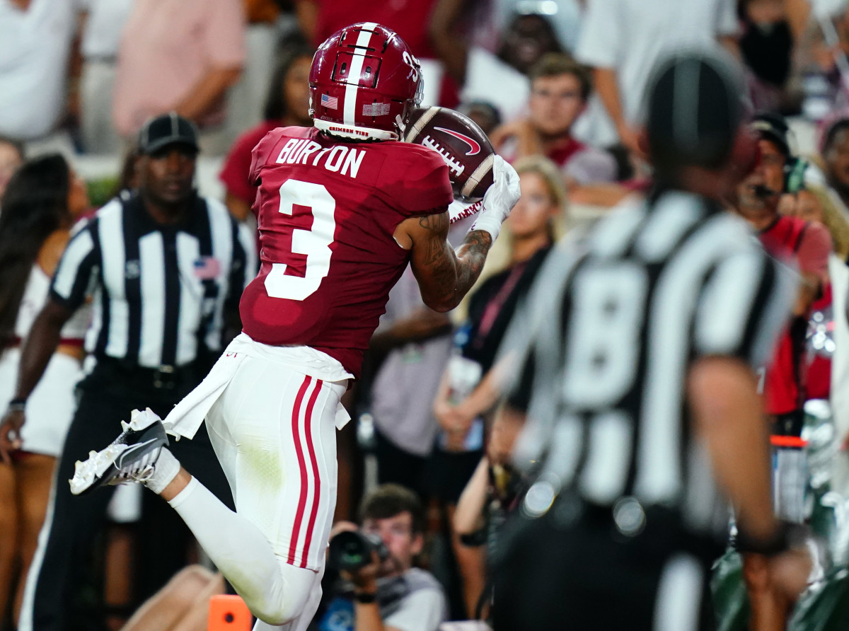 Alabama Crimson Tide wide receiver Jermaine Burton (3) heals in a touchdown against the Texas Longhorns during the third quarter at Bryant-Denny Stadium.