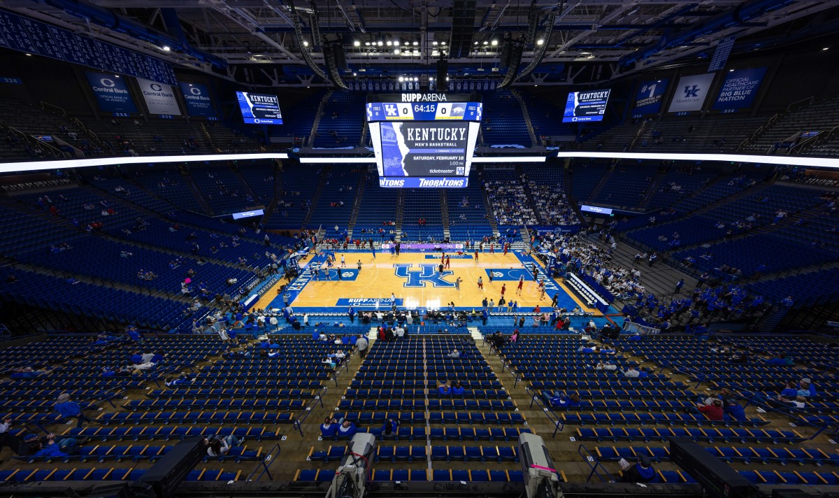 Feb 7, 2023; Lexington, Kentucky, USA; Fans make their way to their seats as players warm up before the game between the Kentucky Wildcats and the Arkansas Razorbacks at Rupp Arena at Central Bank Center. Mandatory Credit: Jordan Prather-USA TODAY Sports