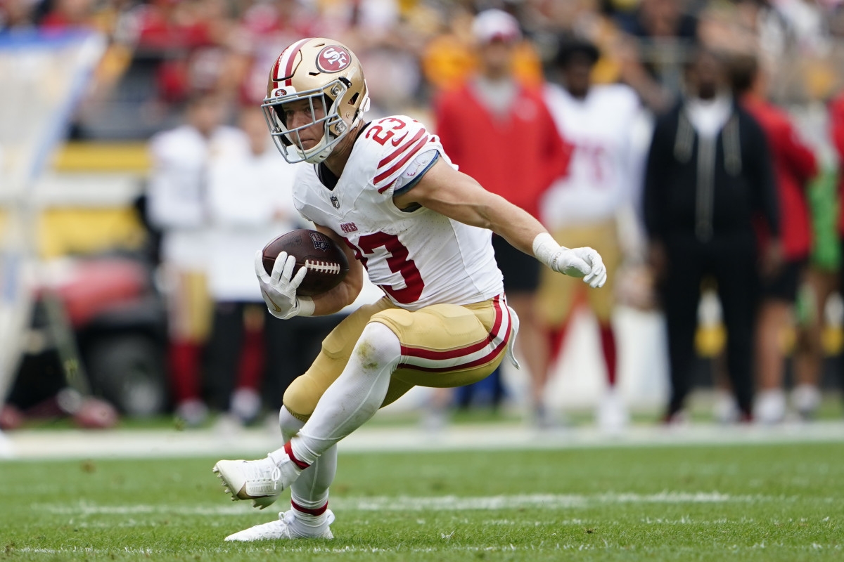 Dec 11, 2022; Santa Clara, California, USA; San Francisco 49ers running  back Christian McCaffrey (23) runs with the football during the third  quarter against the Tampa Bay Buccaneers at Levi's Stadium. Mandatory