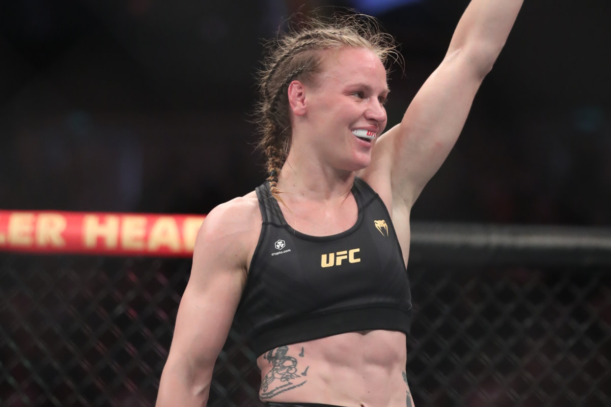 Valentina Shevchenko celebrates after a successful UFC title defense.