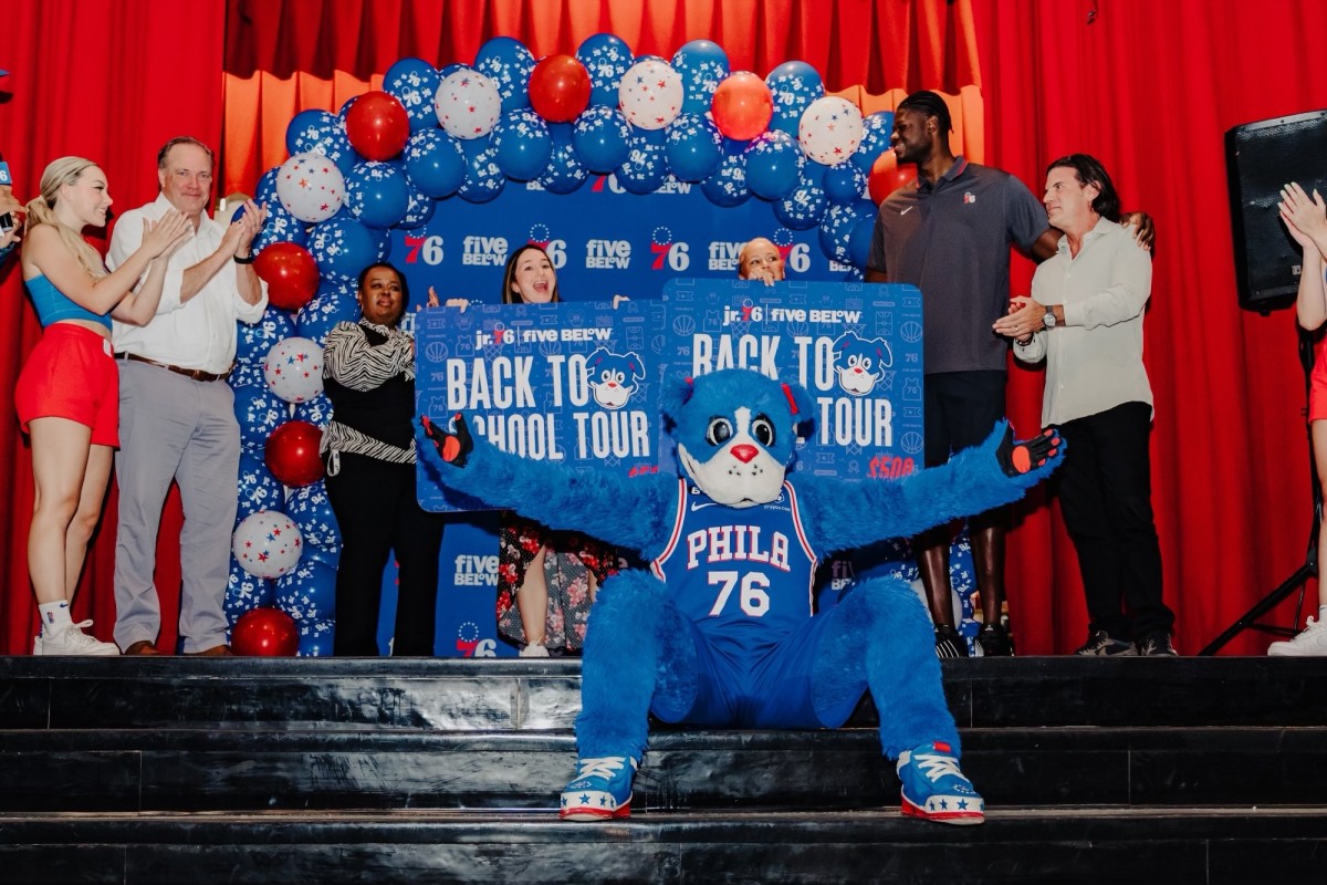 Sixers CEO Tad Brown, Limited Partner David Adelman, and center Mo Bamba surprise students on the Five Below Back-to-School Tour. 