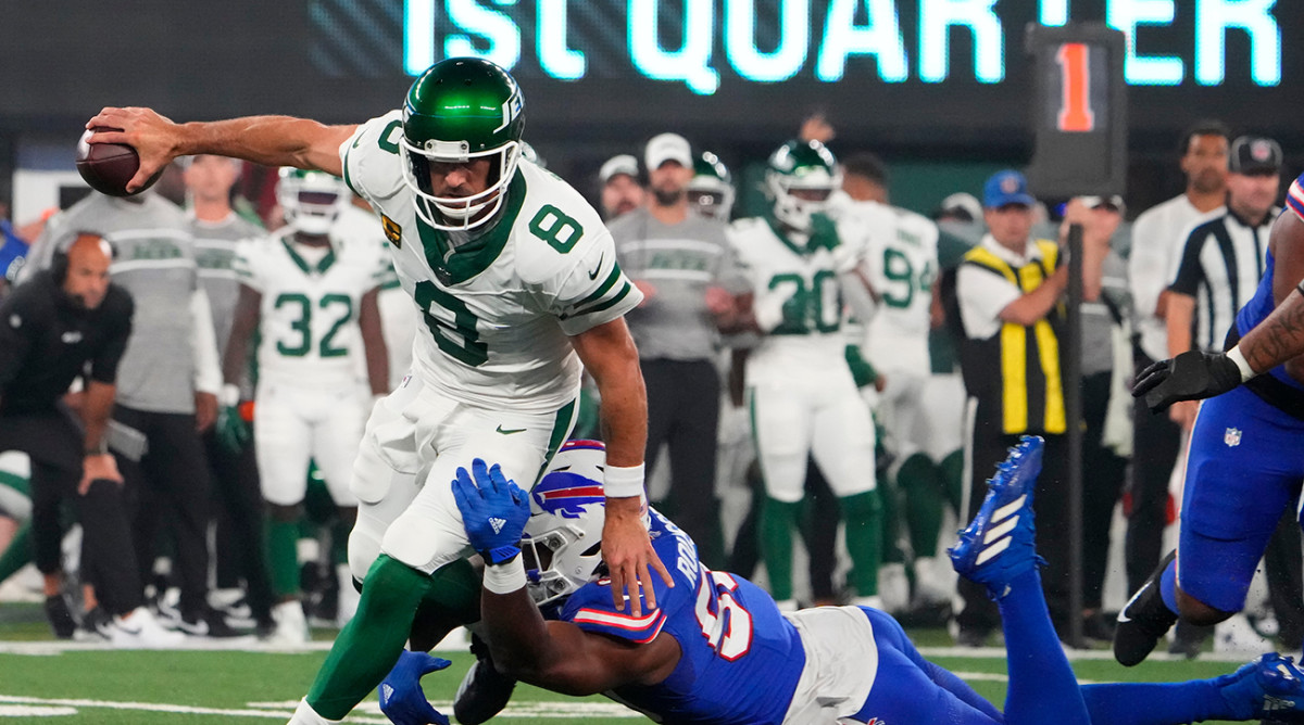 Bills defensive end Greg Rousseau (50) pressures New York Jets quarterback Aaron Rodgers (8) during the first quarter at MetLife Stadium on Sept. 11.