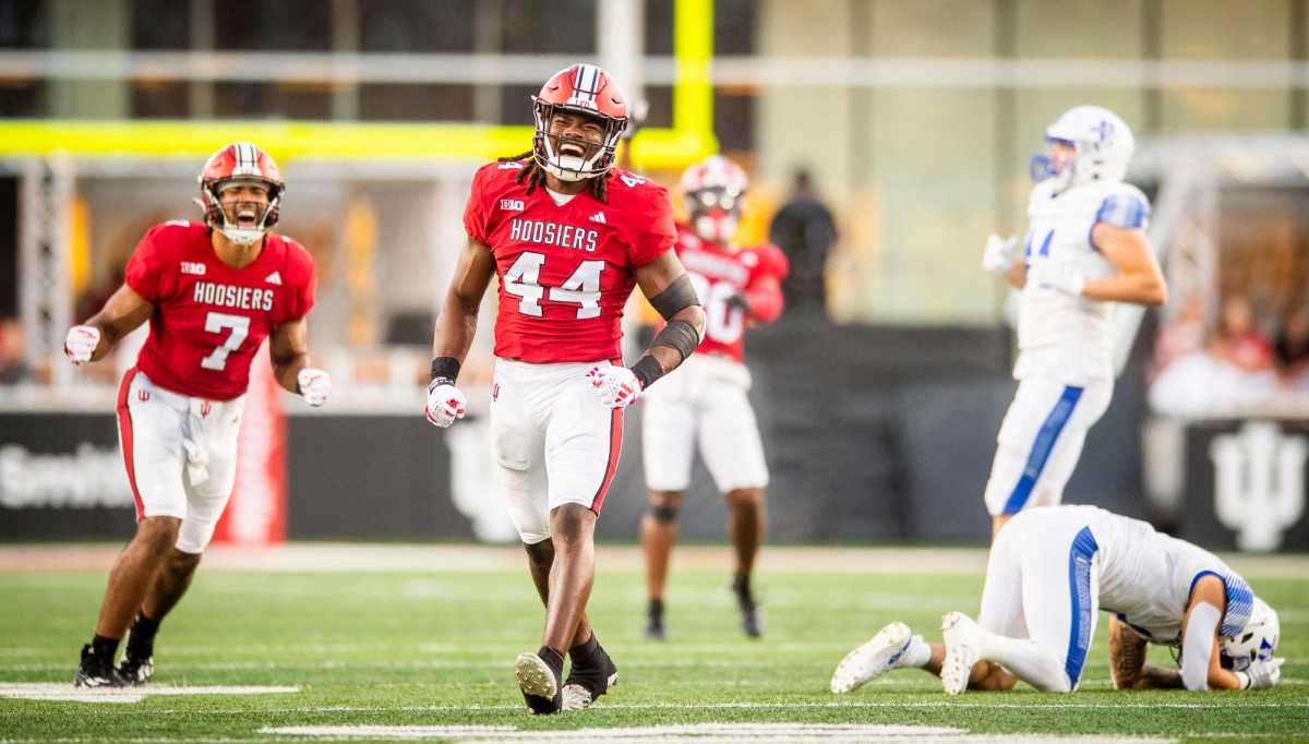 Indiana's Aaron Casey (44) and Jacob Mangum-Farrar (7) celebrate Casey's sack of Indiana State's Evan Olaes (7) during the first half of the Indiana versus Indiana State football game at Memorial Stadium on Friday, Sept. 8, 2023.