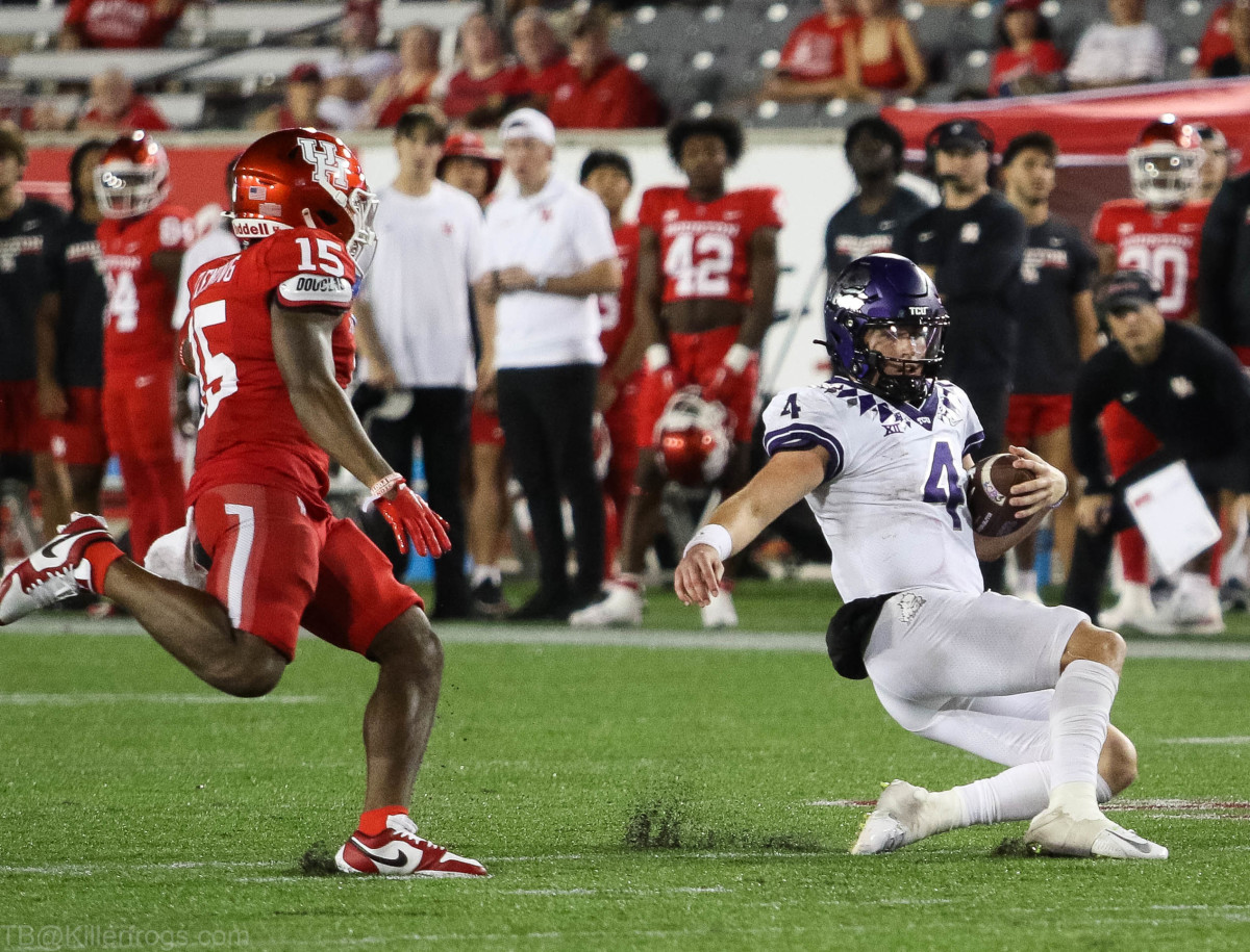 TCU quarterback Chandler Morris slides after running the ball against Houston.