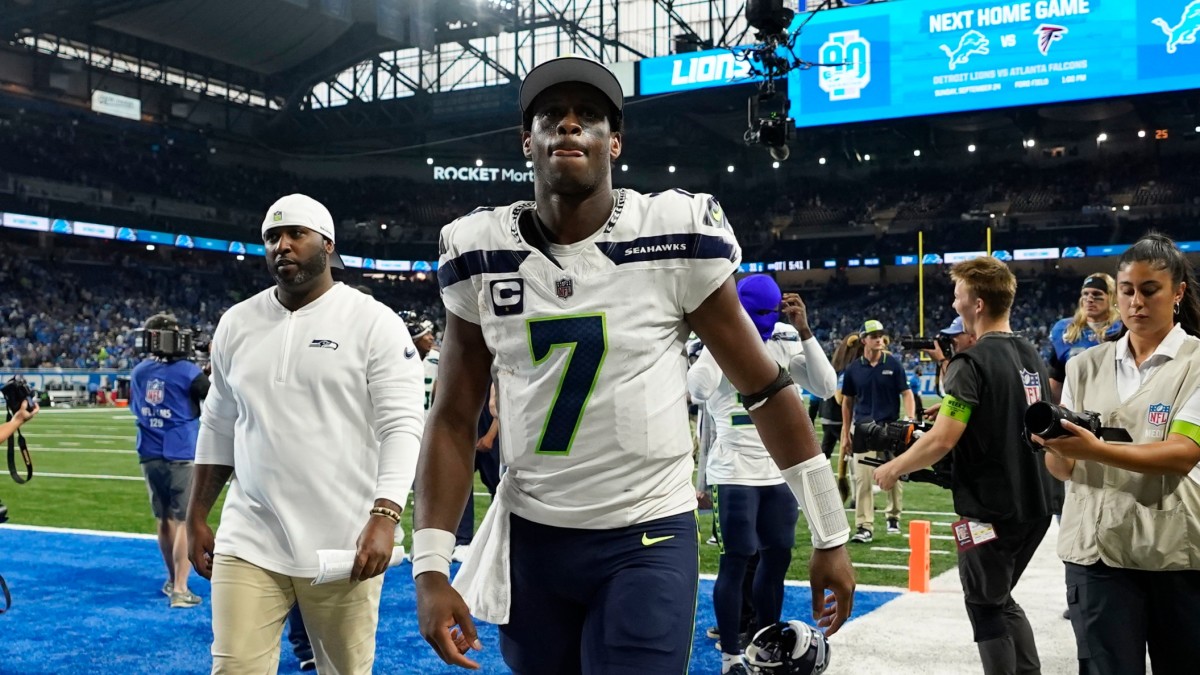 Geno Smith walks off the field after a Week 2 win over the Lions.