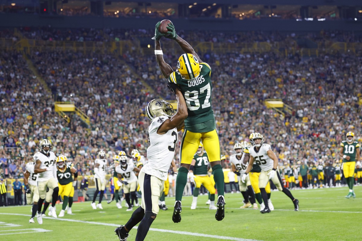 Aug 19, 2022; Green Bay Packers wide receiver Romeo Doubs (87) catches a touchdown pass to against the New Orleans Saints. Mandatory Credit: Jeff Hanisch-USA TODAY Sports