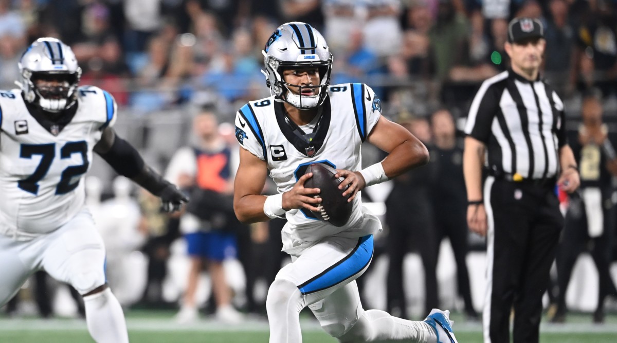 Panthers quarterback Bryce Young scrambles in the fourth quarter.