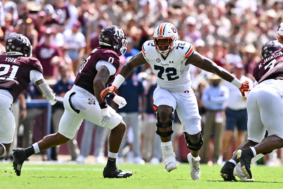 Sep 23, 2023; College Station, Texas, USA; Auburn Tigers offensive lineman Izavion Miller (72) in action during the first half against the Texas A&M Aggies at Kyle Field. Mandatory Credit: Maria Lysaker-USA TODAY Sports  