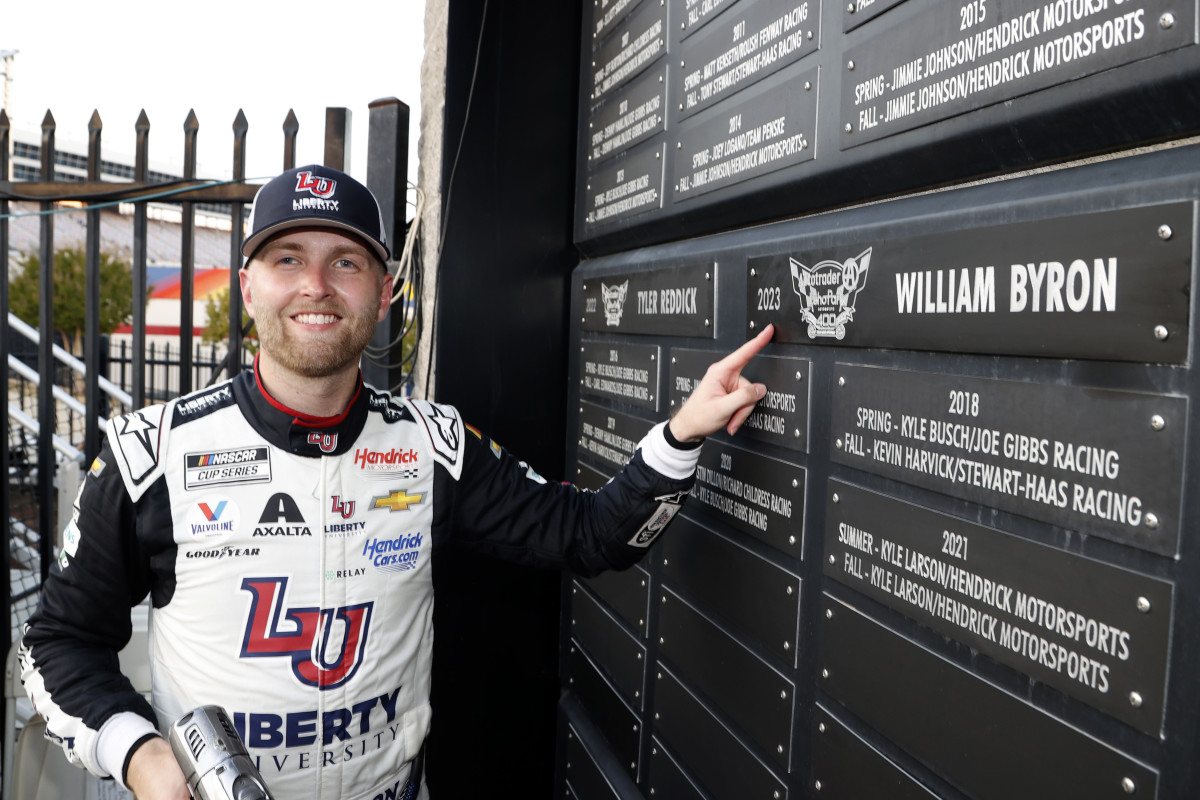 William Byron poses next to his nameplate at the Texas Motor Speedway Wall of Champions after winning Sunday's Autotrader EchoPark Automotive 400 NASCAR Cup playoff race in Fort Worth, Texas. (Photo by Chris Graythen/Getty Images)