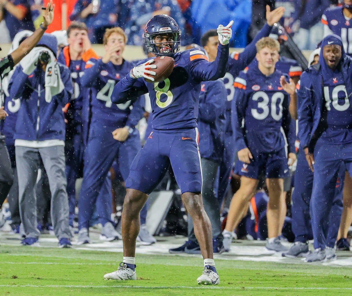 UVA wide receiver Malachi Fields celebrates after making a catch during the Virginia football game against NC State at Scott Stadium.