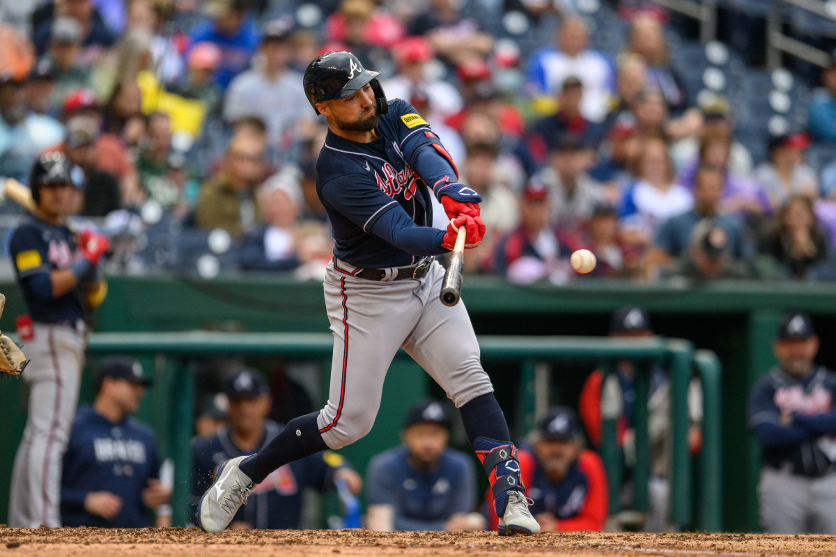 Sep 24, 2023; Washington, District of Columbia, USA; Atlanta Braves left fielder Kevin Pillar (17) hits a single during the seventh inning against the Washington Nationals at Nationals Park.