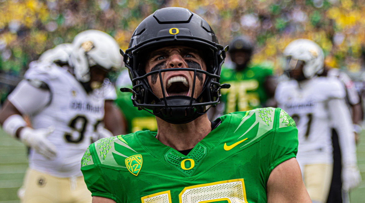 Oregon Ducks quarterback Bo Nix celebrates a touchdown against the Colorado Buffaloes.