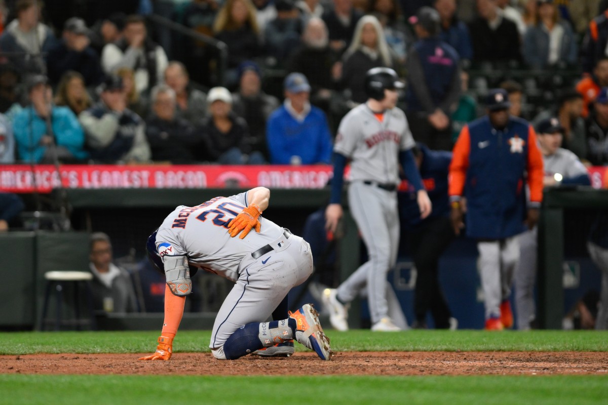 ST. LOUIS, MO - JUN 27: Houston Astros manager Dusty Baker Jr. (12) smiles  as he watches a video on the board before the game between the Houston  Astros and the St.