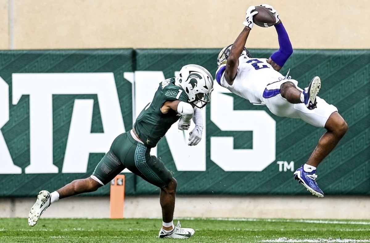 Ja'Lynn Polk will do anything to make the catch, such as this one at Michigan State.