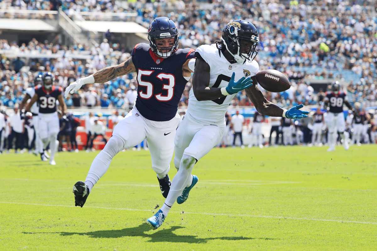 Jacksonville Jaguars wide receiver Calvin Ridley (0) can t haul in a reception against Houston Texans linebacker Blake Cashman (53) during the first quarter of an NFL football matchup Sunday, Sept. 24, 2023 at EverBank Stadium in Jacksonville, Fla. The Houston Texans defeated the Jacksonville Jaguars 37-17. [Corey Perrine/Florida Times-Union]