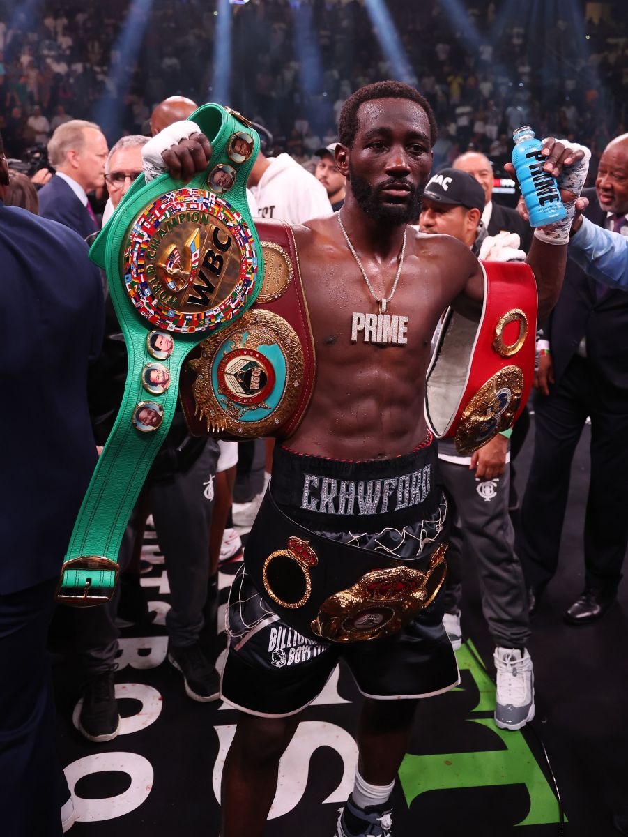 Terence Crawford has his arm raised by Referee Harvey Dock after his 9th round TKO of Errol Spence Jr. at their fight for the undisputed world welterweight championship at T-Mobile Arena in Las Vegas, Nevada on July 29, 2023. (Photo by Al Bello/Getty Images) AL BELLO/GETTY IMAGES 