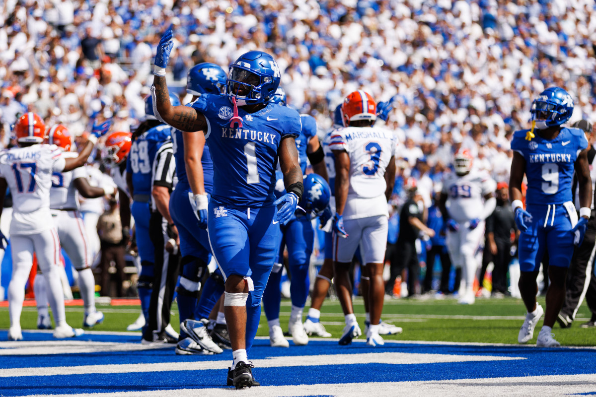 Sep 30, 2023; Lexington, Kentucky, USA; Kentucky Wildcats running back Ray Davis (1) celebrates a touchdown during the second quarter against the Florida Gators at Kroger Field. Mandatory Credit: Jordan Prather-USA TODAY Sports