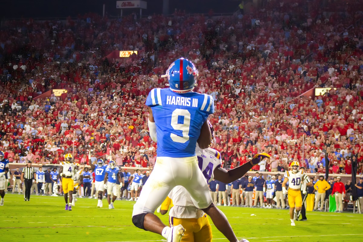 Ole Miss Rebels receiver Tre Harris makes a contested catch in one-on-one coverage vs. the LSU Tigers in Week 5 (2023). 