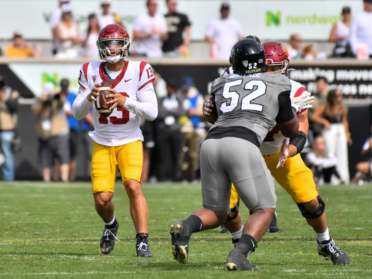 Sep 30, 2023; Boulder, Colorado, USA; USC Trojans quarterback Caleb Williams (13) drops back in the pocket as he look down field during the third quarter against the Colorado Buffaloes at Folsom Field. Mandatory Credit: John Leyba-USA TODAY Sports
